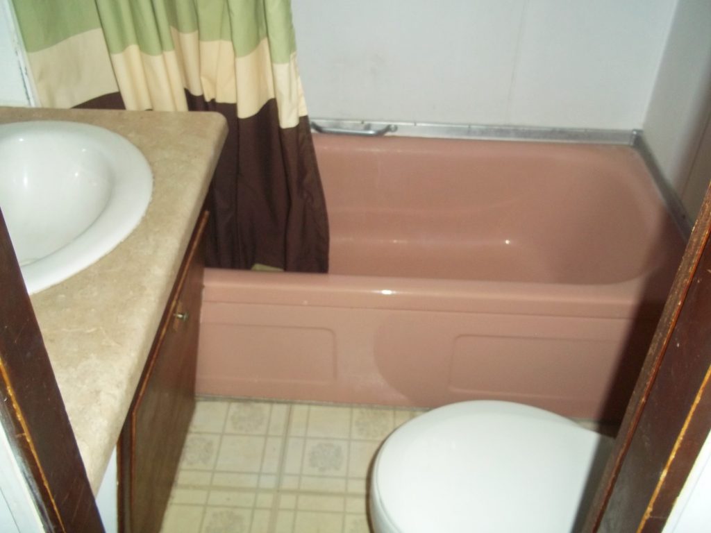 Master Bathroom with Tub and Vanity
